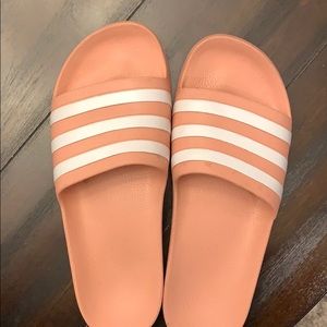 Adidas Slide sandals.